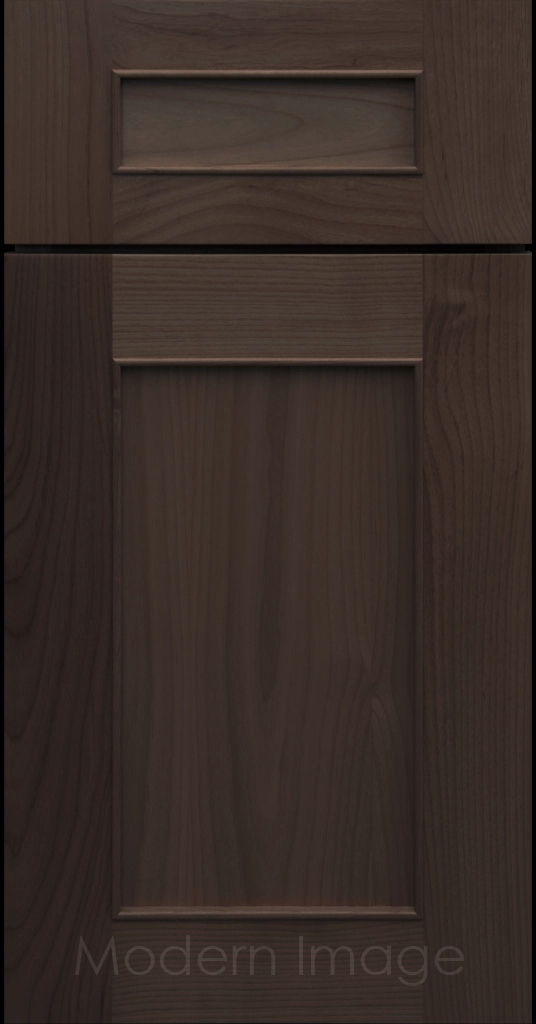 Detail view of a Chandler Shaker cabinet door in Cocoa stain with raised molding along the inner panel.